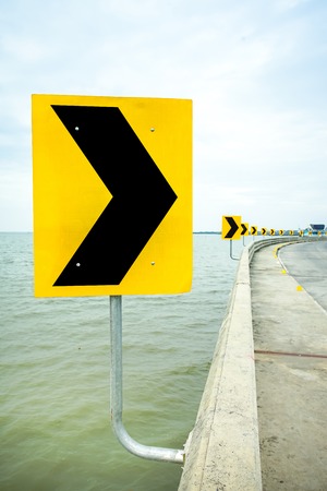 Curve road sign, signal turn right on the curve bridgeの写真素材