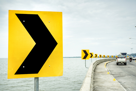Curve road sign, signal turn right on the curve bridgeの写真素材