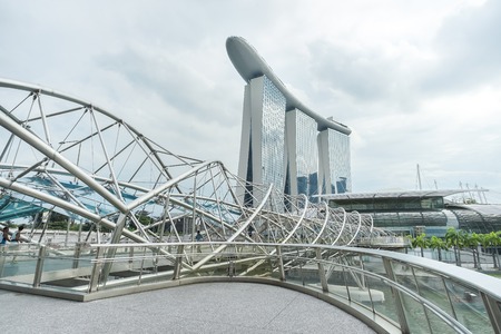 MARINA BAY, SINGAPORE - JAN 20, 2017: Landscape of Helix bridge and Marina Bay Sands in Singapore.のeditorial素材