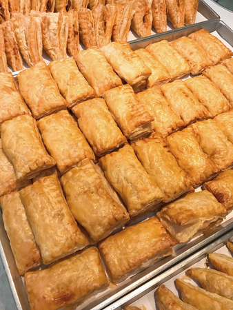 Closed Fresh tuna pies in the food shop