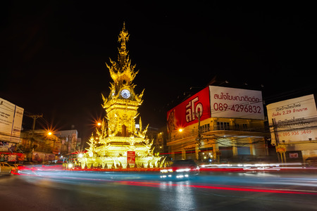 CHIANG RAI, THAILAND - DECEMBER 23 2017 : Nightscape of Golden clock tower , traditional Thai style in Chiang rai, Thailand.のeditorial素材