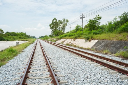 Along the railway in line of sight in Chonburi province, Thailandの写真素材