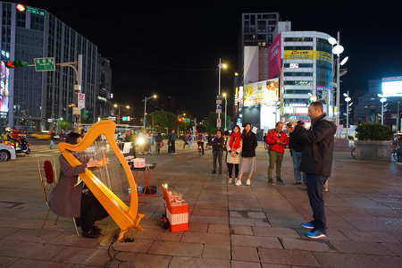 Taipei, Taiwan - November 23, 2018: Nightlife cityscape in Ximending town, Taipei City, Taiwan. This district is the famous fashion, night Market and street food in Taipei.のeditorial素材