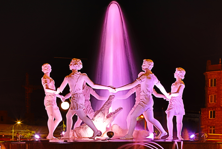 Volgograd, Russia - June 30 2018: View on the fountain near the railway station Volgorad 1, children dancing around the crocodileのeditorial素材