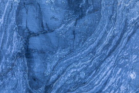 The background or texture of the marble wall of the quarry or opencast. The surface of the marble...