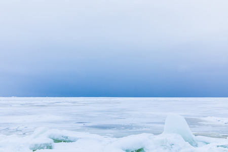 Winter gulf covered with ice