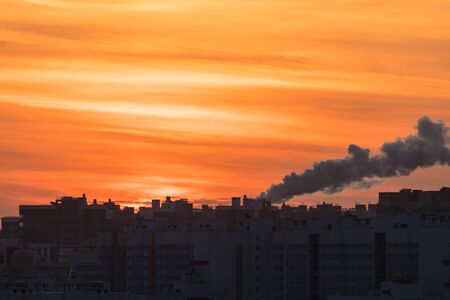 Sunrise or sunset and new buildingsの写真素材