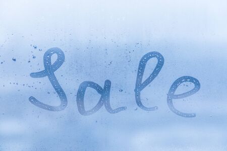 Inscription sale on window glassの写真素材