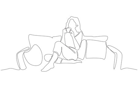 Continuous one line drawing of woman drinking coffee and relaxing on sofa, single line art.のイラスト素材