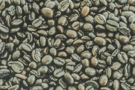 Close up of roasted coffee bean texture background