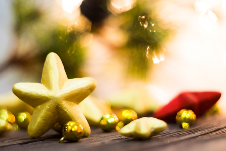 Red and Gold Christmas star  placed on wooden floor ,prepare for Christmas partyの写真素材