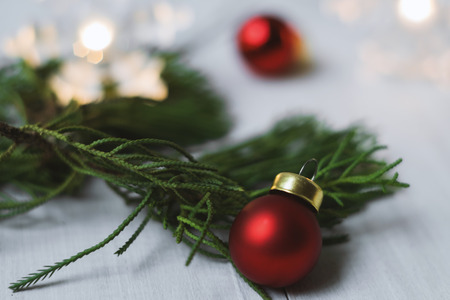 Christmas ball and pine on vintage wooden background,celebration theme happiness partyの写真素材