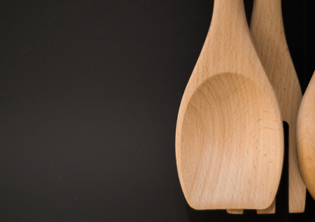 Ladle hang on the gray wallの写真素材