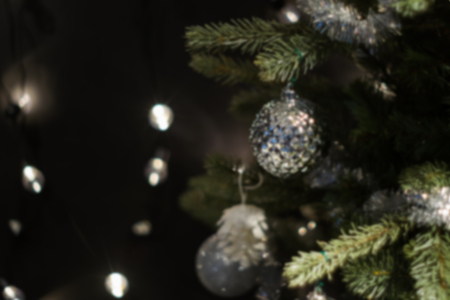 Blurred of silver ball Christmas celebration accessories on Christmas tree prepare for the Christmas and happy New Year festivalの写真素材