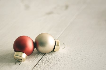 Golden Christmas ball on wooden table,Christmas and happy new year decoration ,celebration theme happiness partyの写真素材