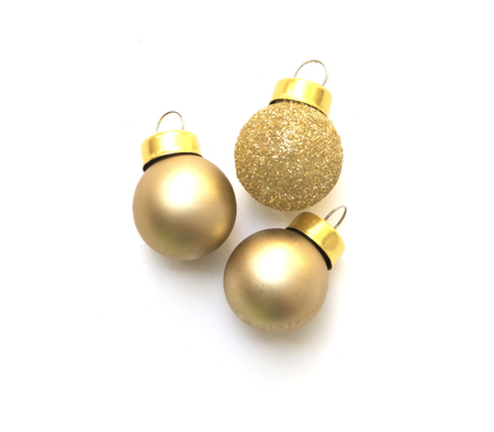 Gold Christmas ball isolated on white backgroundの写真素材
