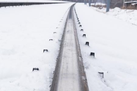Winter and snowstorm on the railroad tracks. snow-covered railsの写真素材