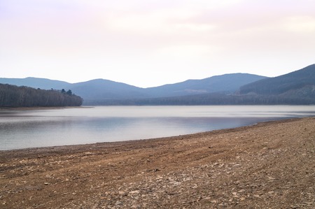 View of the Vladivostok city reservoir of Lake Sedanka. Far Eastern landscape.の写真素材