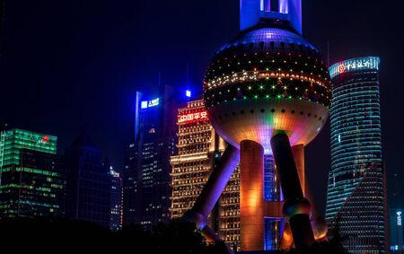 Oriental Pearl Tower and buildings in Pudong is modern district of Shanghai