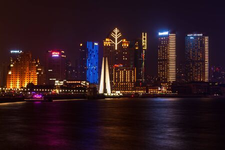 Buildings and architecture with urban skyscrapers in modern district of Shanghai , China