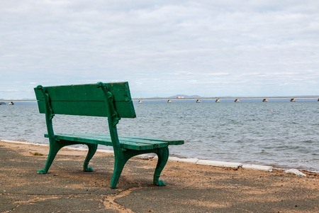 Low water bridge from Sedanka to the De Friz peninsula across the Amur Bay of Primorsky Krai Russia. Far Eastern landscape.の写真素材