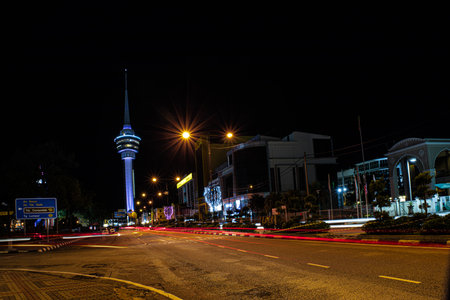 Kuantan, Malaysia - November 14, 2022: Light trails of vehicles in movement on the road with...