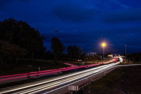 Light trails of the vehicles speeding in movement on the Highway