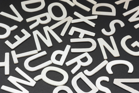 Letters of wood on a black backgroundの写真素材