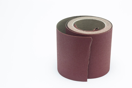 Roll of sandpaper brown isolated on white backgroundの写真素材