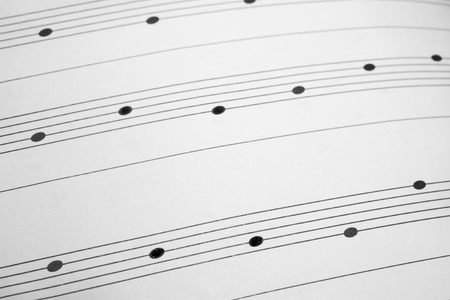 Musical notes on staves as a concept of music educationの写真素材