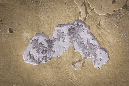 Close up of a broken wall to conceive a background conceptの写真素材