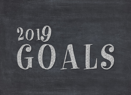 2019 goals - new year resolution concept - handwriting in chalk on black chalkboardの写真素材