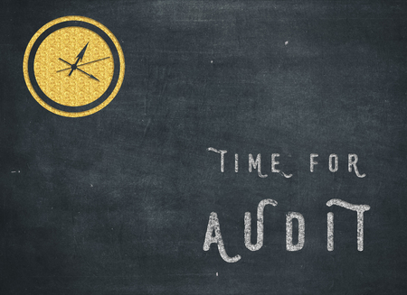 Time for Audit - clock with text on blue background to mean a business conceptの写真素材