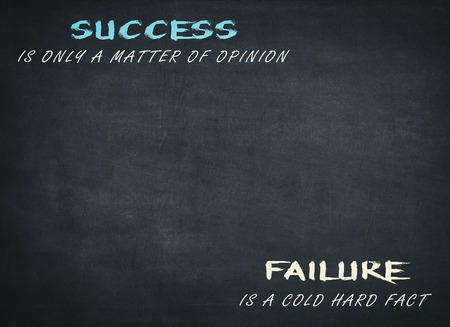 Business Success quote on blackboard with green background to mean a conceptの写真素材