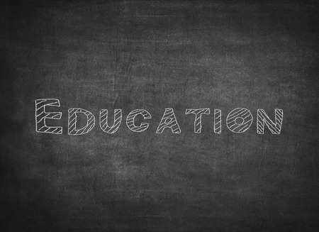 The word education written on a blackboardの写真素材