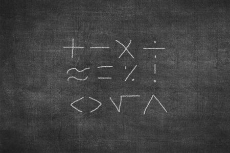 Set of math symbol draw by chalk on black board backgroundの写真素材