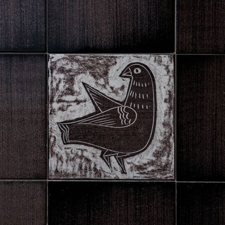 VIETRI SUL MARE, ITALY - 12 October 2019 Representation of a dove of peace on a wall of ceramic tiles, the Amalfi Coast. Italy to mean a conceptのeditorial素材