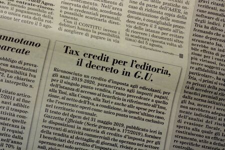 SALERNO, ITALY - NOVEMBER 1, 2019: The first page of ITALIA OGGI an Italian legal, economic, political newspaper for an editorial conceptのeditorial素材