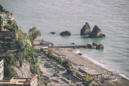 VIETRI SUL MARE, ITALY - November 20, 2019 Panoramic view in vintage style of a coastal village during winterのeditorial素材