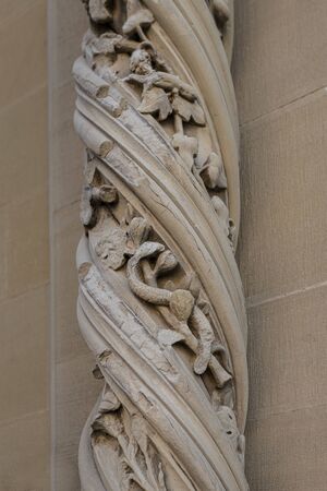 AREZZO, ITALY - September 18, 2019: Detail of the twisted column outside the Cathedral of Arezzo (Cathedral of Ss. Donato and Pietro) in the city of Arezzo in Tuscany, Italyのeditorial素材