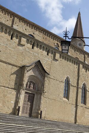 AREZZO, ITALY - September 18, 2019: Cathedral of Saints Peter and Donato Arezzo side viewのeditorial素材