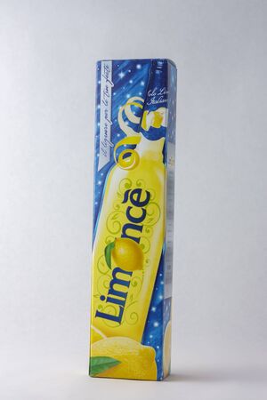 Matera, Italy - May 26, 2019: Pack of a bottle of limoncello on a white background to mean a business conceptのeditorial素材