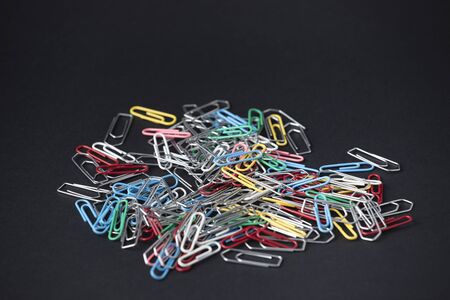 Paper clips macro closeup to mean a concept
