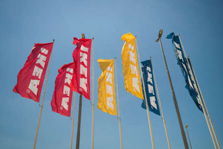 Salerno, Italy - July 18, 2020: IKEA logo on colored flags. IKEA is a large furniture retailer and...