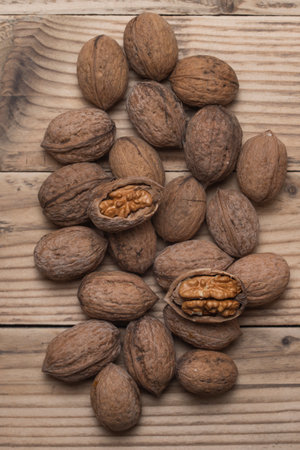 Walnut kernels and whole walnuts.の写真素材