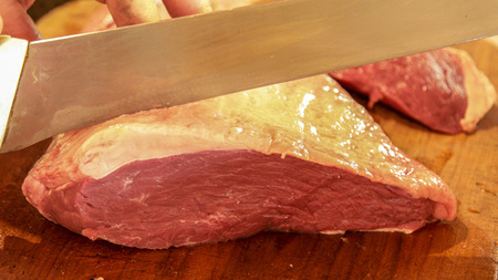 Meat picanha in fire Brazilの写真素材