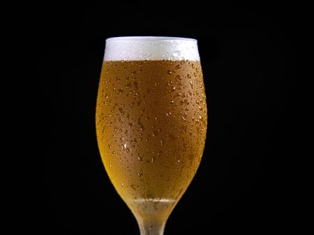 Droplets on freshly poured beer detail macro delicious unfocusedの写真素材