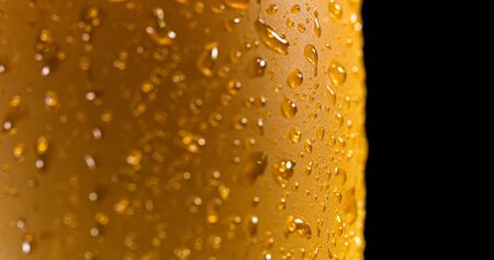 Droplets on freshly poured beer detail macro delicious unfocused