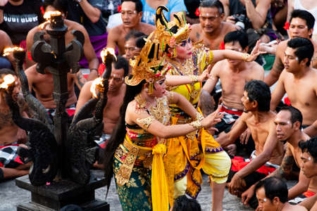 Historic Kecak & Fire dance performed at the top of magnificent cliff in Uluwatu area, Bali,...