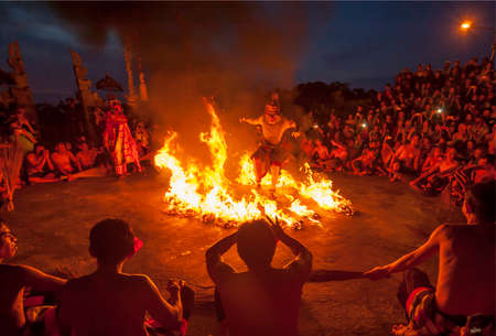 Historic Kecak & Fire dance performed at the top of magnificent cliff in Uluwatu area, Bali, Indonesia.のeditorial素材